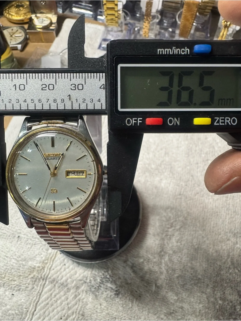 Seiko Two-Tone Silver and Gold Men's Quartz Watch with Day-Date
